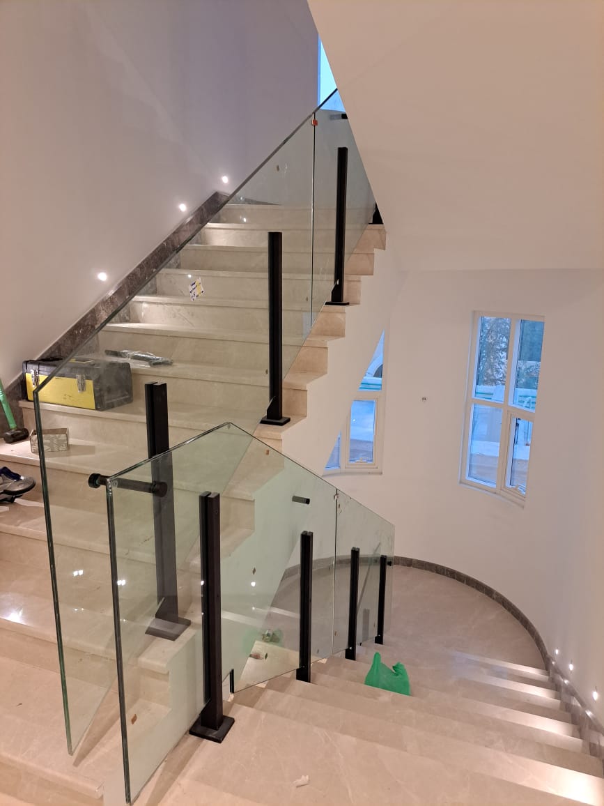 Glass Stair Balustrade — Frameless glass with metal posts