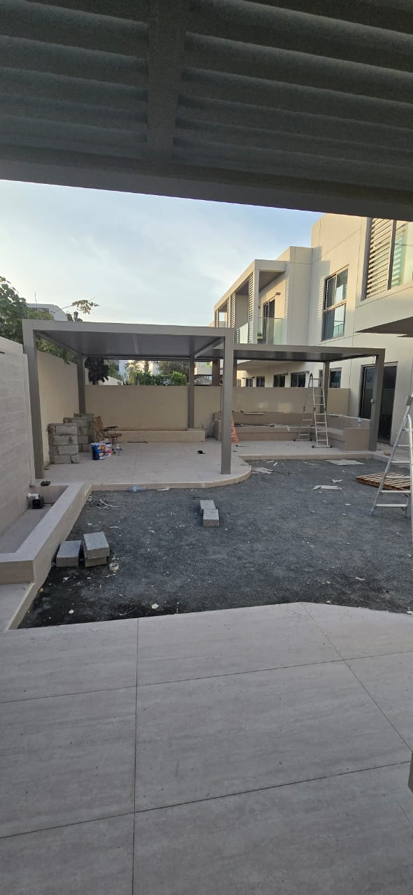 Pergola Structure — Fabricated metal frame under installation